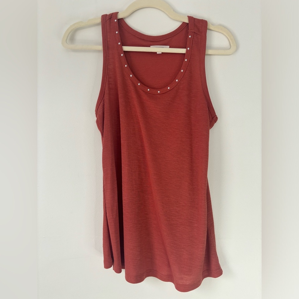 Burnt orange tank top from Maurice’s, size XS.